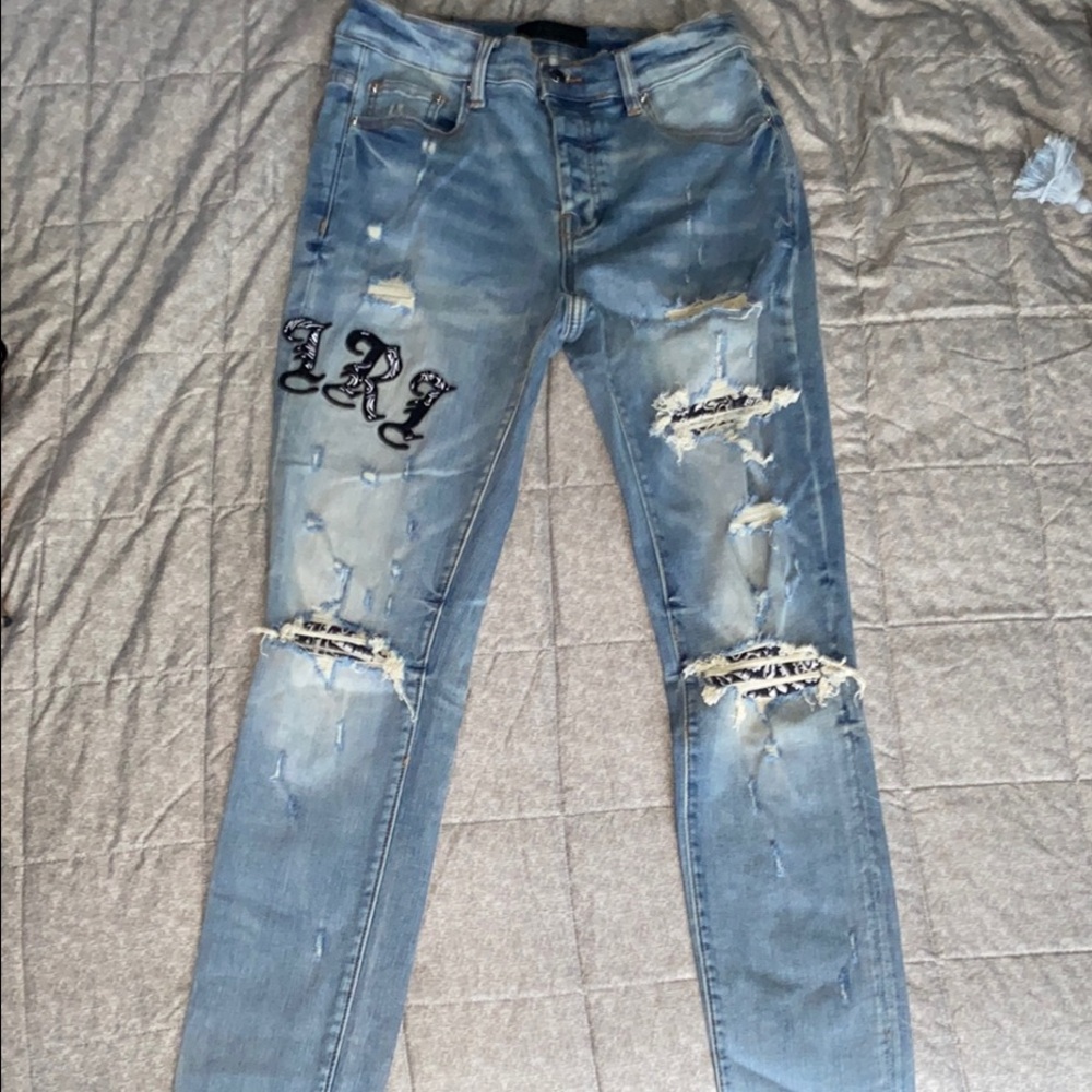 AMIRI Blue Skinny Black Patch/Writing Distressed Jeans